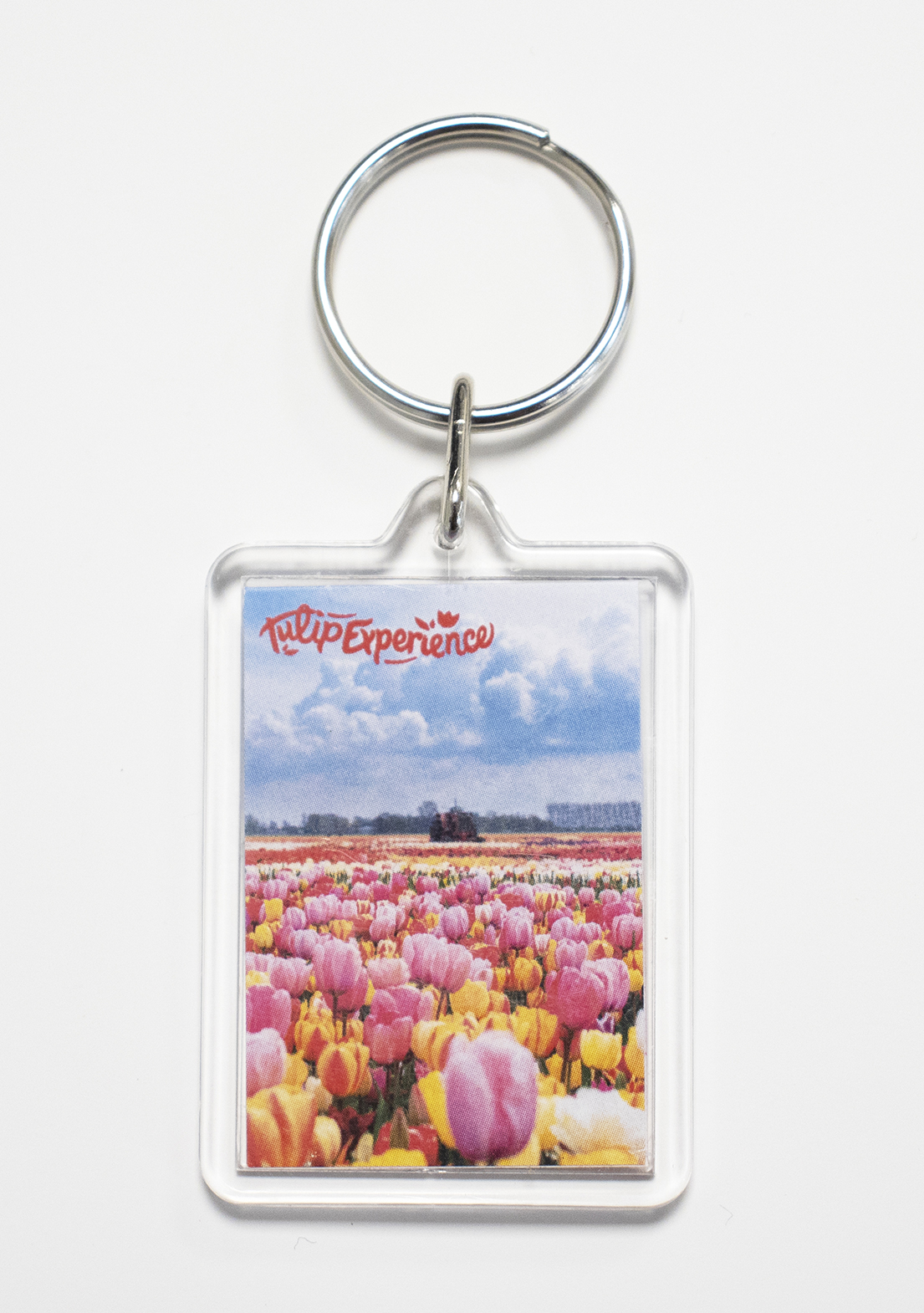 Sleutelhanger: een veld vol bloemen en een tractor